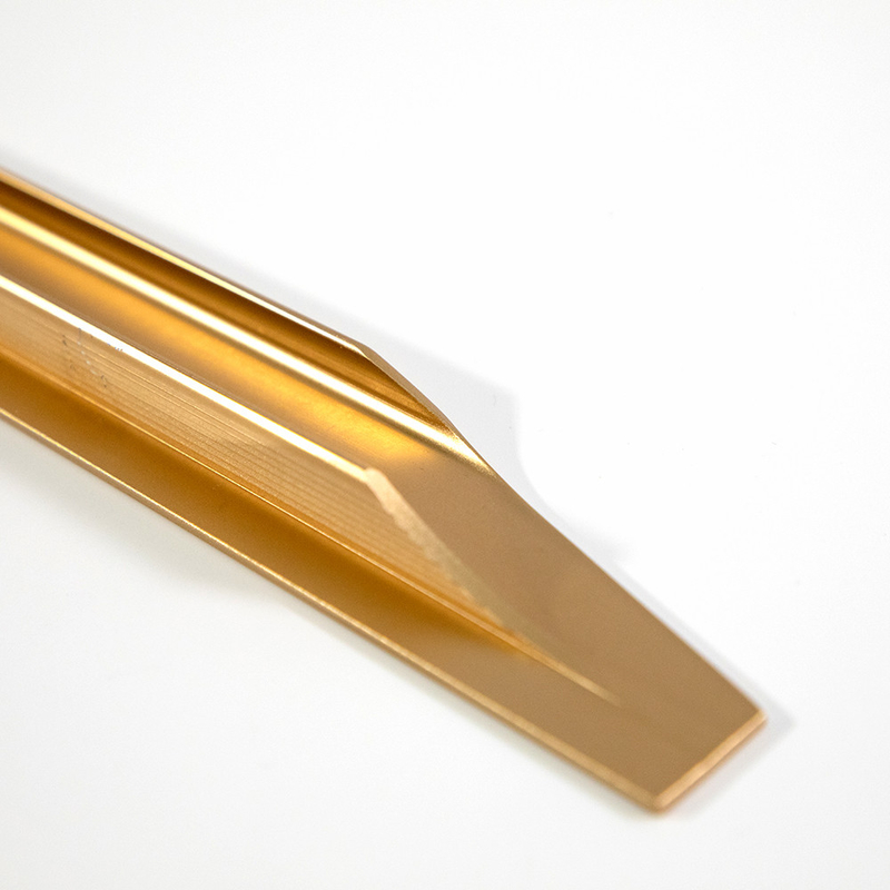 O ouro J dá forma às trações que de alumínio da borda o dedo moderno do armário puxa o metal para a biblioteca